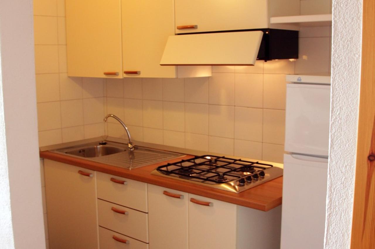 Residence Portolaconia Appartamenti Канніджоне Номер фото